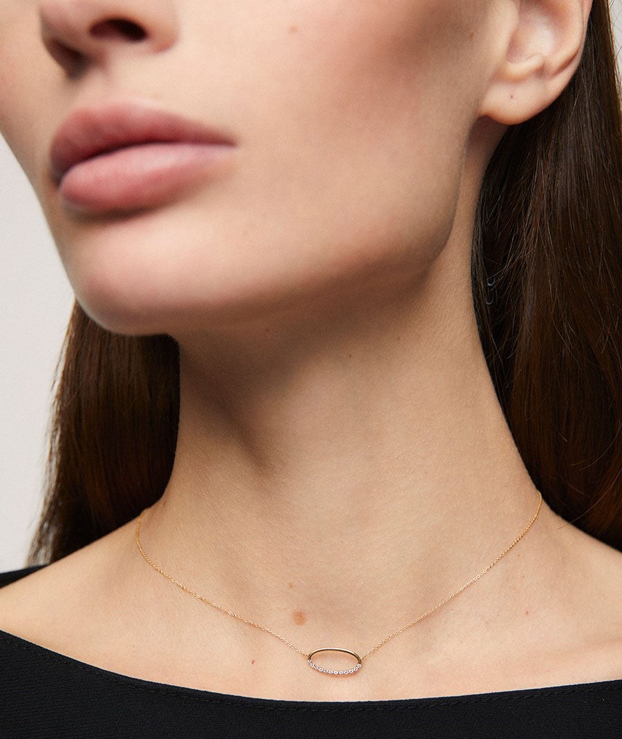 Diamond and gold oval necklace